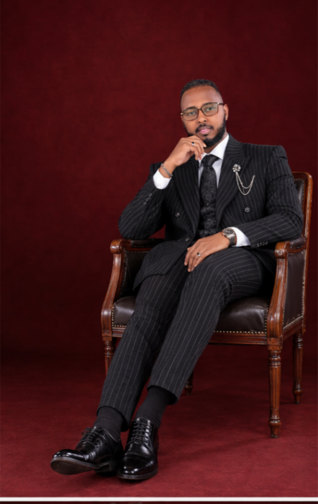 Full pinstripe suit outfit with black lace-up dress shoes